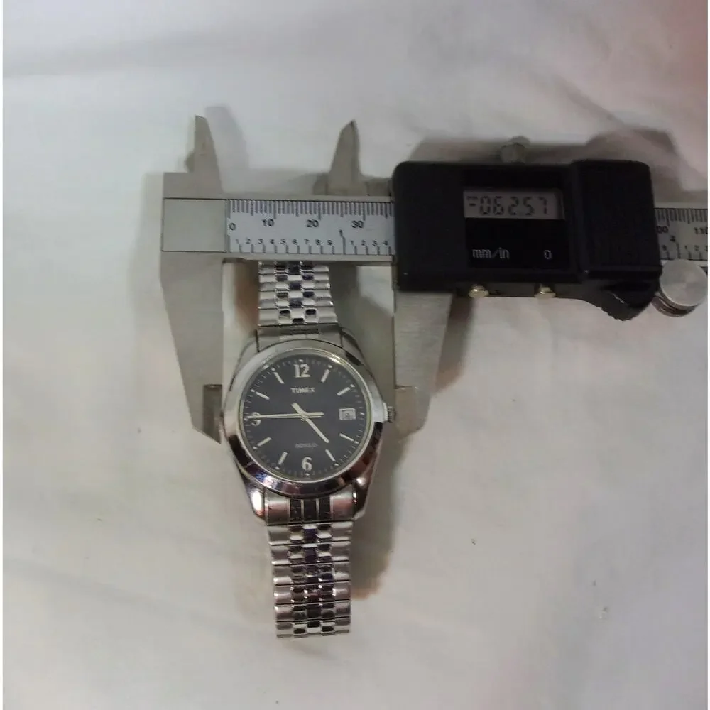 LOT OF TWO MEN'S WATCHES ONE RUMOURS QUARTZ ONE TIMEX INDIGLO-BOTH WORKING